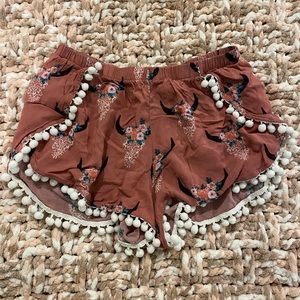 Shorts with flowers and horns